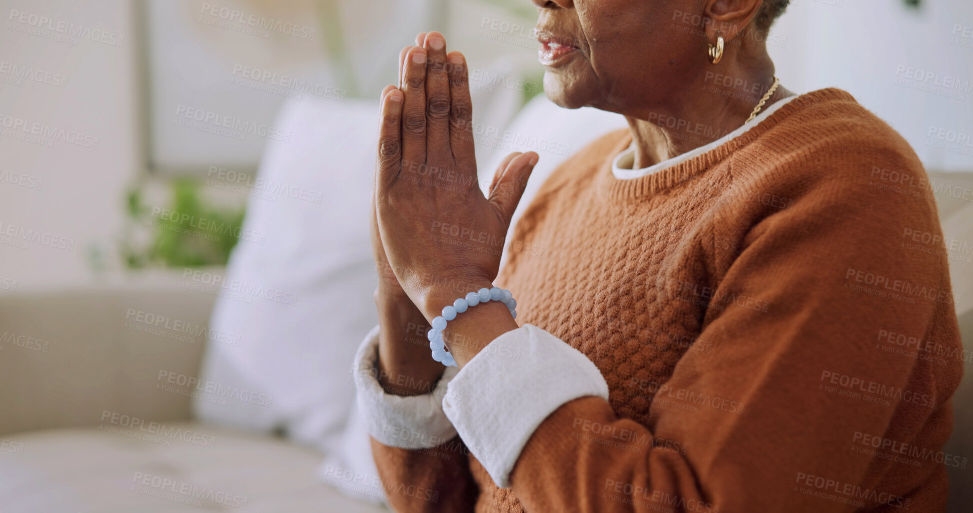 Buy stock photo Prayer, hands and senior woman in lounge, retirement and Christian with faith and worship in house. Religion, home and elderly person with belief in God, hope and spiritual praise in living room
