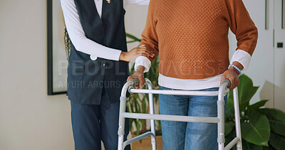 Buy stock photo Caregiver, support and hands with walker in nursing home, rehabilitation or help for senior patient. Homecare, nurse and walking with elderly person, healthcare and assisted mobility for recovery