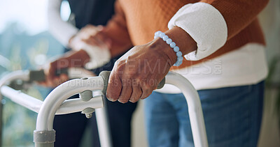 Buy stock photo Caregiver, help and hands with walker in nursing home, rehabilitation or support for senior patient. Homecare, nurse and walking with elderly person, healthcare and assisted mobility for recovery