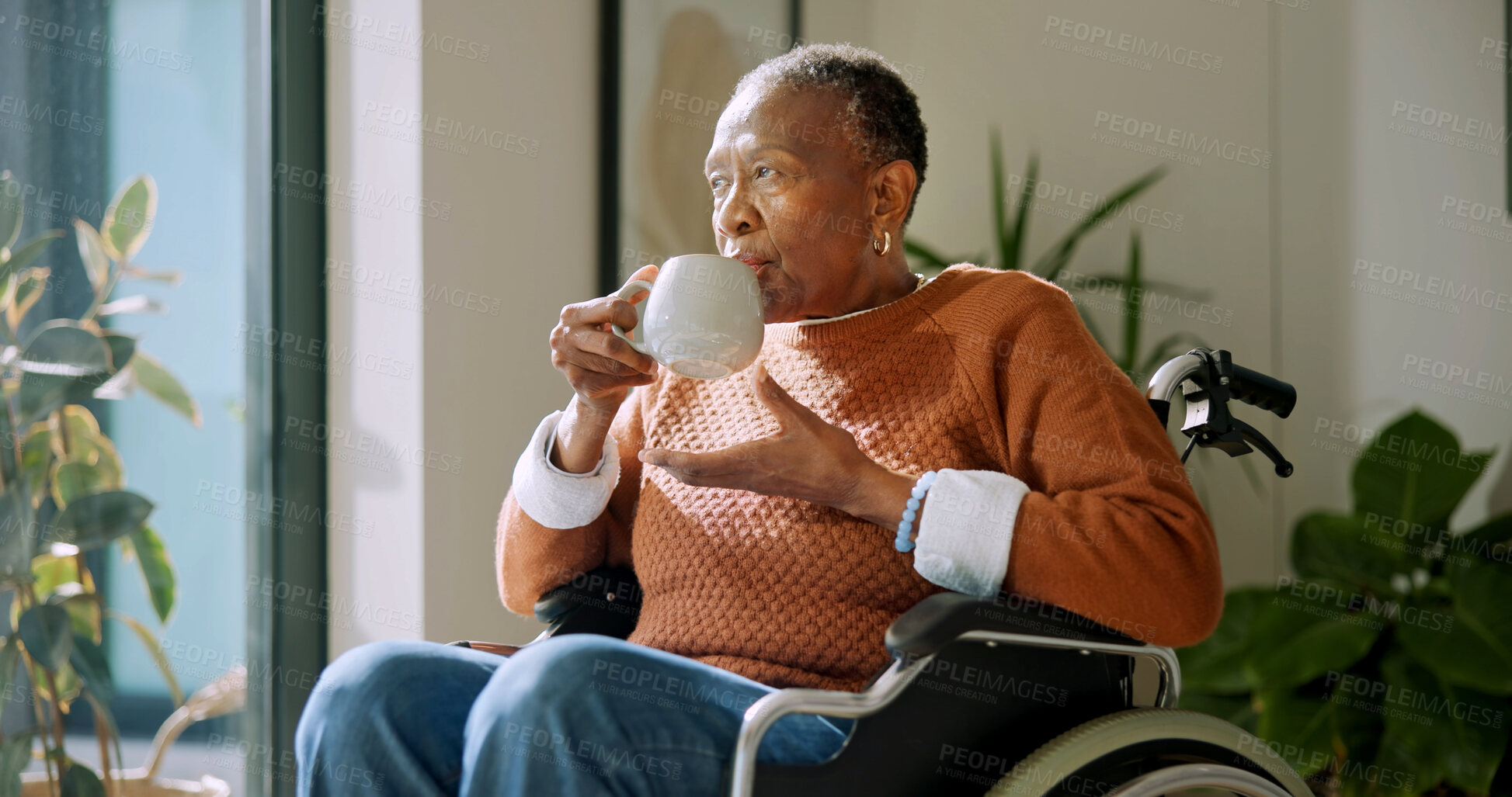 Buy stock photo Coffee, thinking and old woman in retirement home with wheelchair, daydream and nostalgia for past. Reflection, tea and senior black person with disability, remember memories and wonder by window.