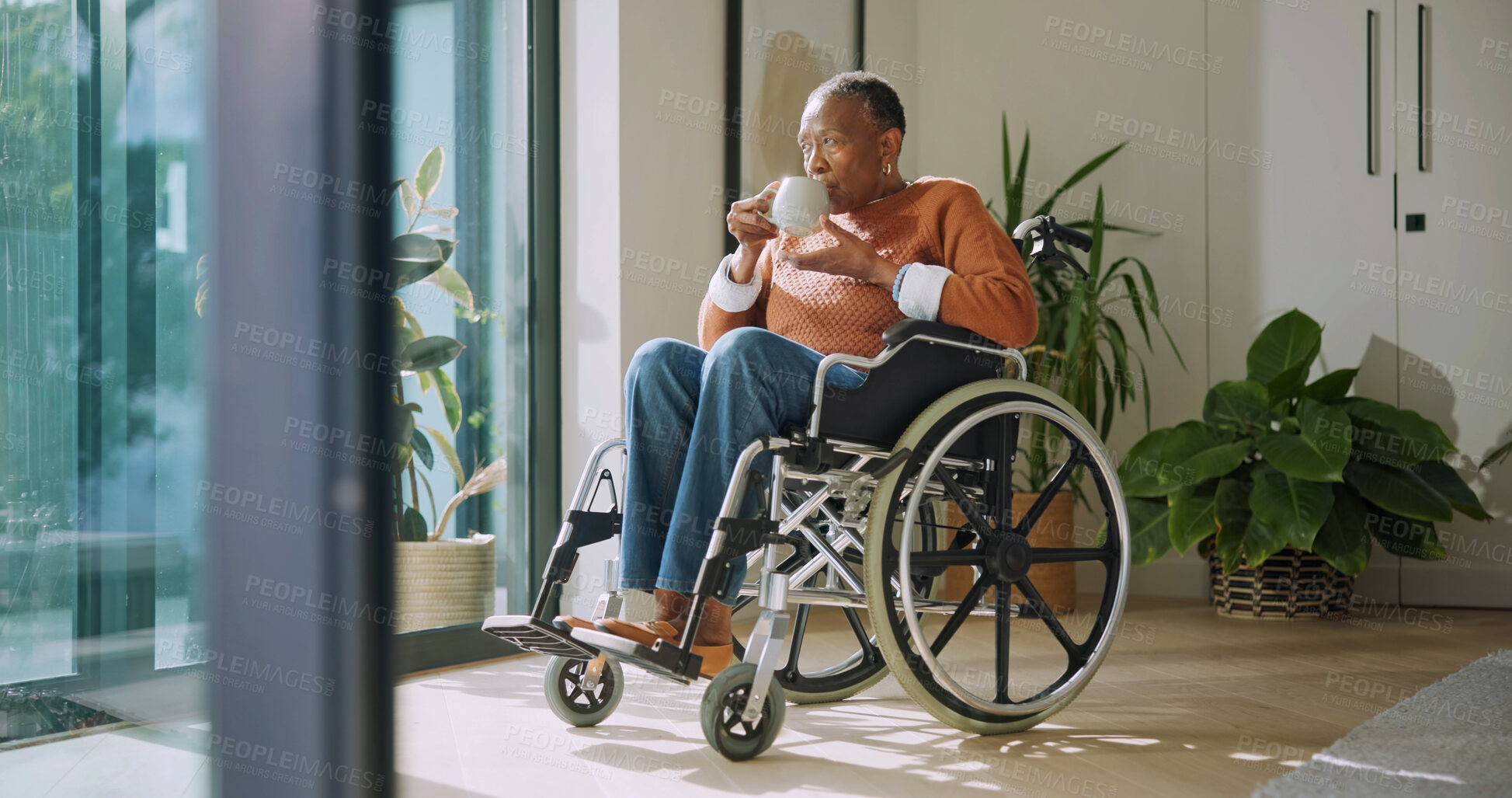 Buy stock photo Tea, thinking and old woman in retirement home with wheelchair, vision and remember memories of past. Coffee, reflection and senior black person with disability, nostalgia and daydream by window.
