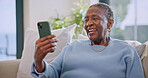 Video call, online and old woman with phone in lounge, laugh and communication with contact on web. Retirement, home and senior black person with mobile, happiness and virtual chat with social media