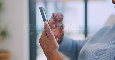 Buy stock photo Texting, online and hands with phone in home, scroll and communication with contact on social media. Typing, message and senior person with mobile, retirement and browsing chat on website in house