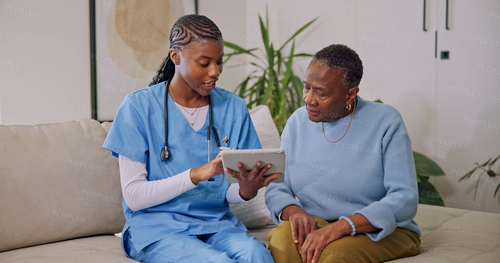 Buy stock photo Tablet, nurse and senior woman in home for talking, telehealth app and help for medical report. Healthcare, retirement and caregiver with African patient for support, wellness and assisted living