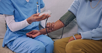 Buy stock photo Nurse, hands and patient in nursing home with blood pressure machine for medical evaluation. Healthcare, monitor hypertension and person with caregiver, assisted living and wellness check in lounge