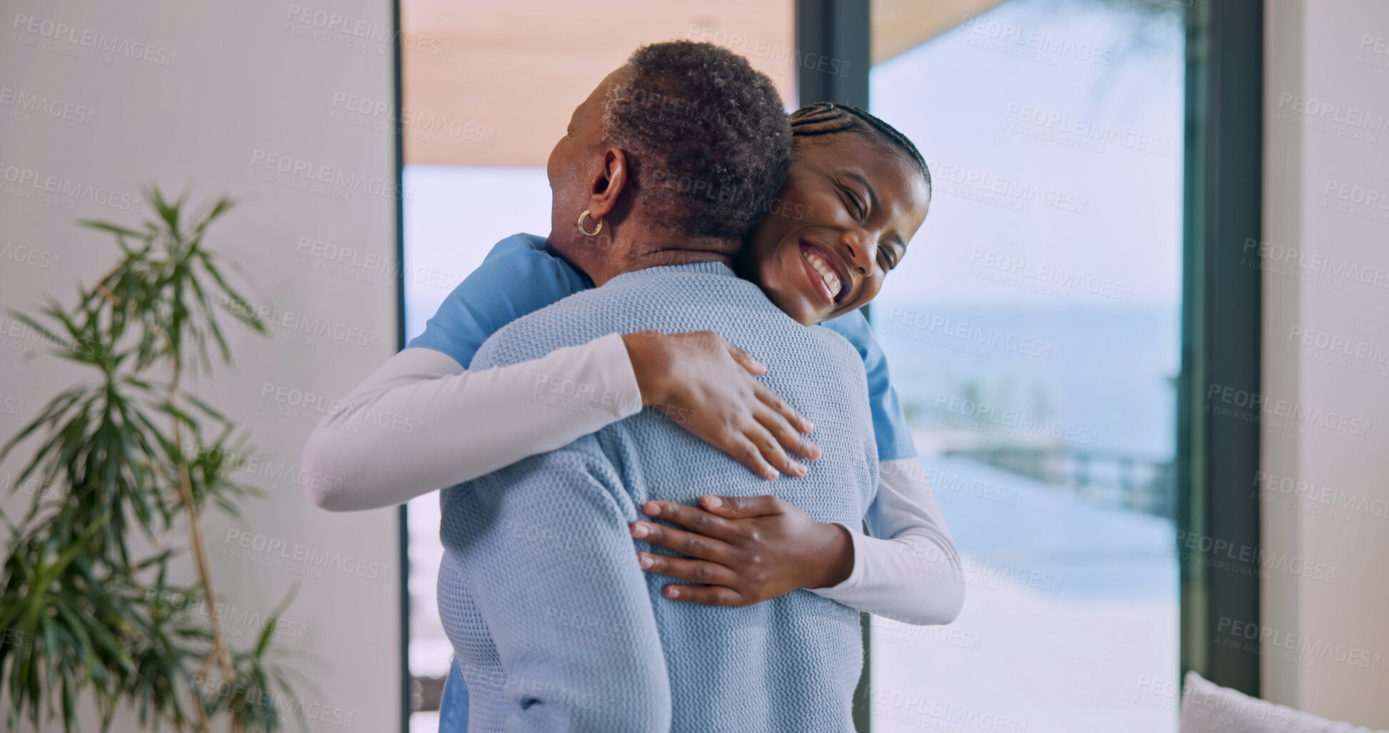 Buy stock photo Caregiver, hug and old woman in nursing home with smile, assistance and support for rehabilitation. Happy, nurse and senior person in retirement center with embrace, help and healthcare for wellness.