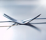 Forks, balance and utensils on a table in the kitchen for eating at a restaurant, home or house. Stainless steel, metal or silver parallel cutlery, tableware or object to eat or cook a meal.
