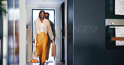 Buy stock photo Smile, couple and bags at house with groceries, weekly shopping and restock food for pantry. Black people, walk and parcel at front door with fresh fruit, household essentials and meal prep for lunch