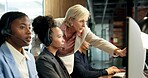 Computer, pointing and training with people in call center together for advice, consulting or help. Coaching, headset and manager speaking to employee in office for customer service or support