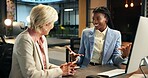 Collaboration, excited and talking with business women at desk in office for planning or research. Conversation, feedback and smile with happy employee people in corporate workplace for development