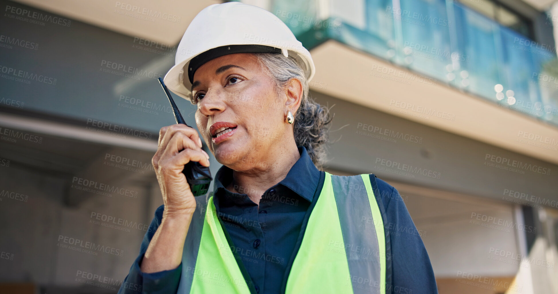 Buy stock photo Architect, radio and woman with talk on construction site for inspection, planning or renovation. Engineer, communication and mature person for property development, building project or remodeling