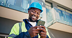 Electrician, phone and black man with smile and renovation for building, planning or inspection. Engineer, person and message on tech for property development, construction site or remodeling project