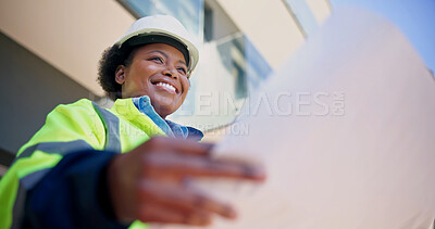 Buy stock photo Happy, engineer and woman with blueprint, outdoor and planning for property development and design. Civil engineering, low angle and black person with document, architecture or real estate investment