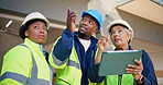 Engineer, team and plan at construction site with tablet,  discussion or technician with inspection. Supervisor, people and point in building with tech, check engineering and talk with electrician.