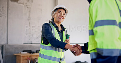 Buy stock photo Woman, smile or handshake at construction site for meeting, development team or introduction. Mature worker, deal or shaking hands at worksite for welcome, engineer collaboration or building feedback