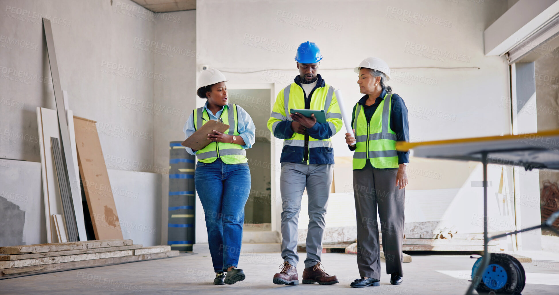 Buy stock photo Engineer, team and inspection at building site with tablet, walk or technician with electrical plan. Supervisor, people and construction with tech, engineering discussion or electrician review design
