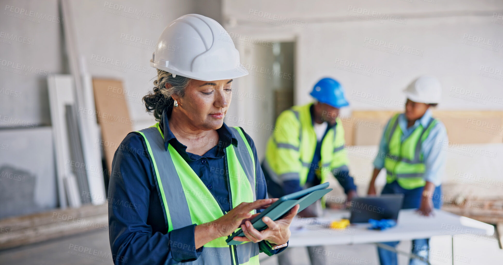 Buy stock photo Construction, review and woman on site with tablet, project agenda or progress track for renovation. Reading, ppe or mature supervisor with tech, operation schedule or inspection report in remodeling