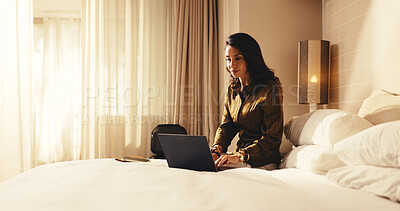 Buy stock photo Woman, typing and laptop in hotel room for business trip, check schedule and planning for itinerary. Mature person, browsing and online in accommodation with computer, travel and calendar for work.