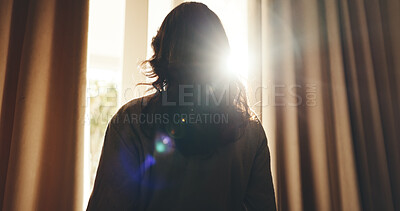 Buy stock photo Back, woman and thinking in hotel with window, peaceful vacation and daylight to wake up in morning. Flare, person start day and reflection in accommodation with fresh air, holiday and wellness.