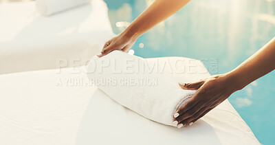 Buy stock photo Hands, woman and bed at spa with towel, massage preparation and cleanliness for guest hospitality. Masseuse, organising and housekeeping at resort with fresh linen, arrangement and luxury treatment
