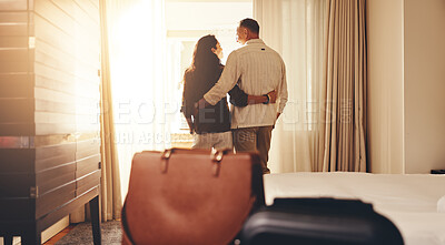 Buy stock photo Back, couple and hug in hotel room with window, bonding together or romantic getaway for anniversary. Happy, mature people and embrace in holiday accommodation with love, marriage commitment and care