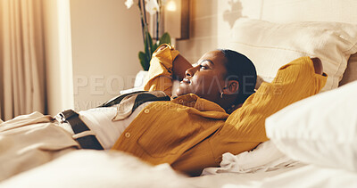 Buy stock photo Bed, woman and relax in hotel room with thinking, travel exhaustion and vision of vacation itinerary. Calm, tourist and person rest in accommodation with fatigue, daydream and unwind for holiday.