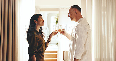 Buy stock photo Happy, couple and cheers in hotel room with champagne, anniversary celebration and romantic getaway. Mature people, smile and toast in holiday accommodation with drink, relationship milestone or love