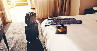 Buy stock photo Luggage, tech and passport in empty hotel room for business trip, international event or conference. Suitcase, phone and ID documents in accommodation for overseas work, job convention and travel.