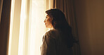 Woman, thinking and relax in hotel with window, peaceful morning and travel for me time on vacation. Calm, mature person and wake up in accommodation with reflection, wellness and vision for holiday.