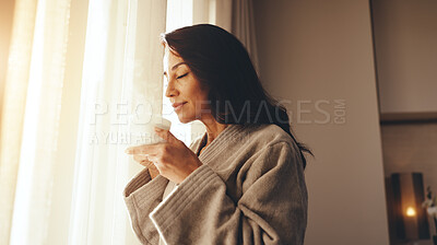 Buy stock photo Woman, relax and smell coffee in hotel room with peaceful morning, reflection or downtime on holiday. Calm, mature person and tea aroma by resort window with wellness, vacation and weekend getaway.