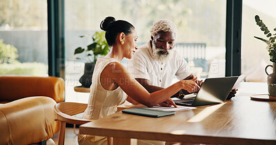 Buy stock photo Marriage, finance and mature couple on laptop for mortgage, online banking and bills in home. Talking, interracial relationship and man with woman with computer, financial report and budget payment