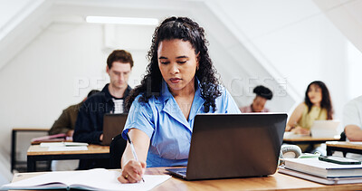 Buy stock photo College, notes and student in class with laptop, exam preparation and research for assignment. Education, study and woman at campus with writing, university thesis and digital revision for assessment
