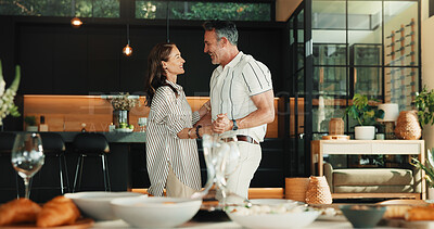 Buy stock photo Smile, dance and couple in home for love with romantic commitment, holding hands or bonding together. Happy mature man, woman and moving with music for marriage connection, partner support and care