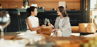 Buy stock photo Friends, relax and toast in home with champagne, bonding together or congratulations for achievement. Happy, mature women and cheers on sofa with alcohol drink, conversation or celebration of success
