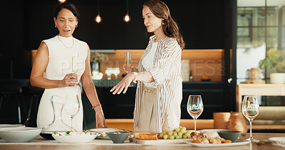 Buy stock photo Friends, host and food on dining table at house for social gathering, meal and place setting. Mature women, happy and together in home with healthy snack, brunch or dietary talk for party catering