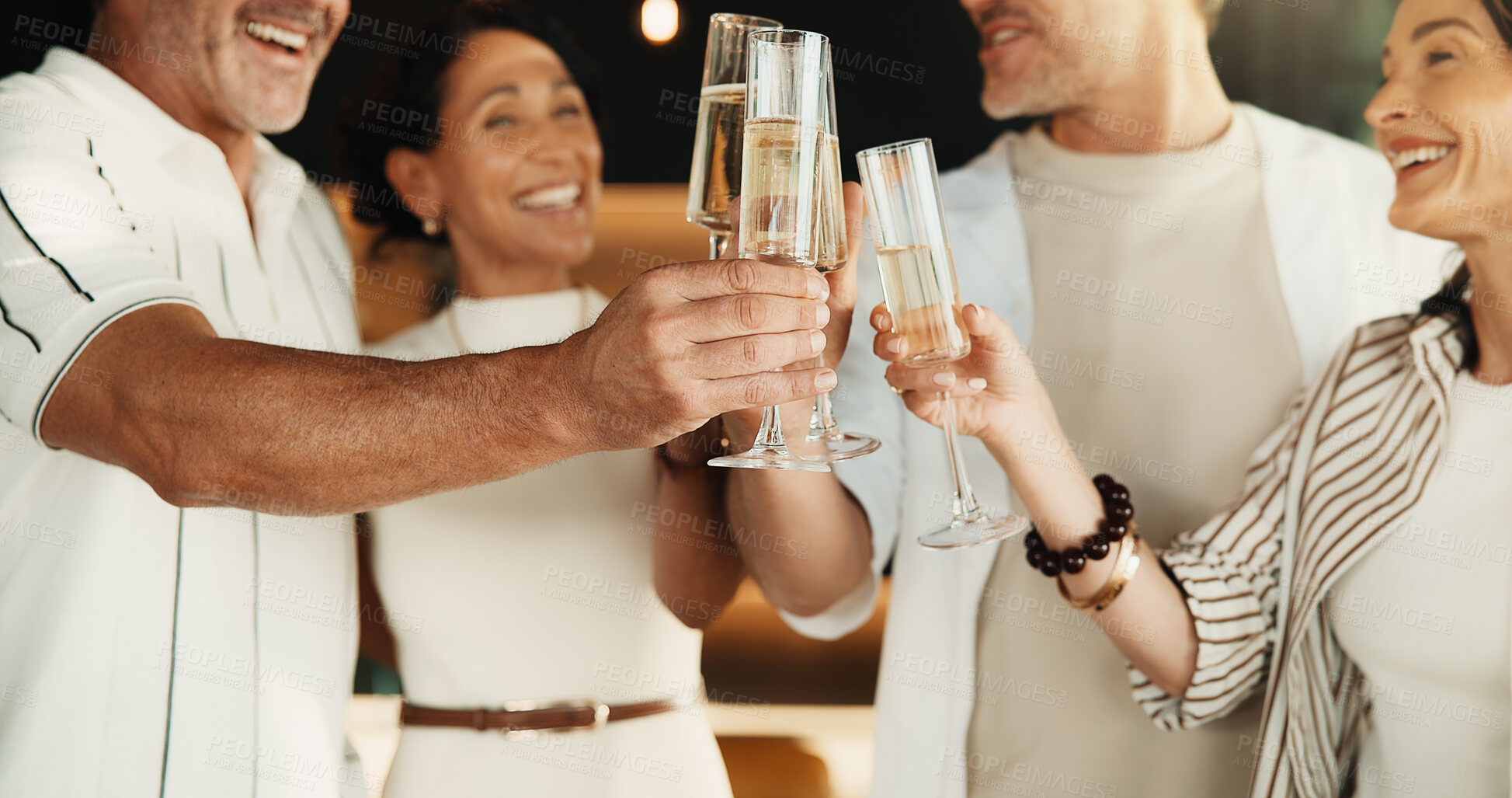 Buy stock photo Friends, champagne and hands for cheers in house for celebration, social gathering or reunion. Mature men, women and happy with alcohol drinks in home for toast, support and holiday with couples