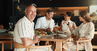 Buy stock photo Host, portrait or man in house with friends, satisfaction or happy moment with celebration bonding. Wellness, smile or mature people with meal, reunion party or positive attitude at social gathering.