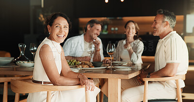 Buy stock photo Celebration, friends or woman in house with portrait, satisfaction or happy moment in dinner bonding. Wellness, smile and mature host with meal, reunion party and good time at social gathering.