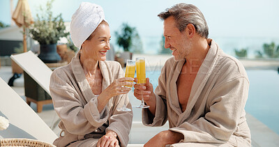Buy stock photo Relax, cheers and happy couple with drink for vacation, holiday getaway or date in luxury resort. Man, woman and toast with smile by swimming pool for weekend trip or accommodation in beauty spa