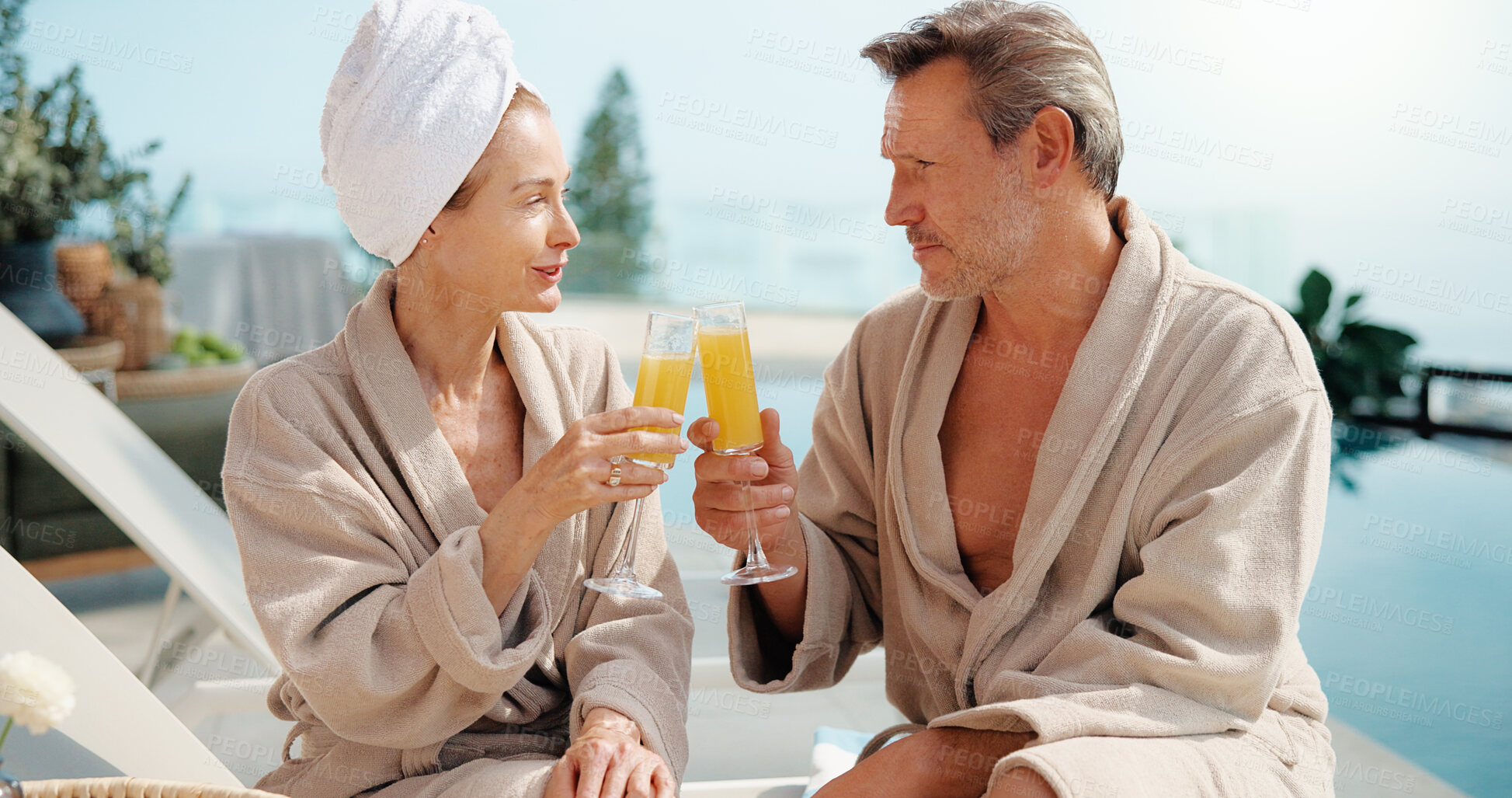 Buy stock photo Relax, cheers and couple with drink for vacation, holiday getaway or romantic date in luxury resort. Man, woman and toast with glass by swimming pool for weekend trip or accommodation in beauty spa