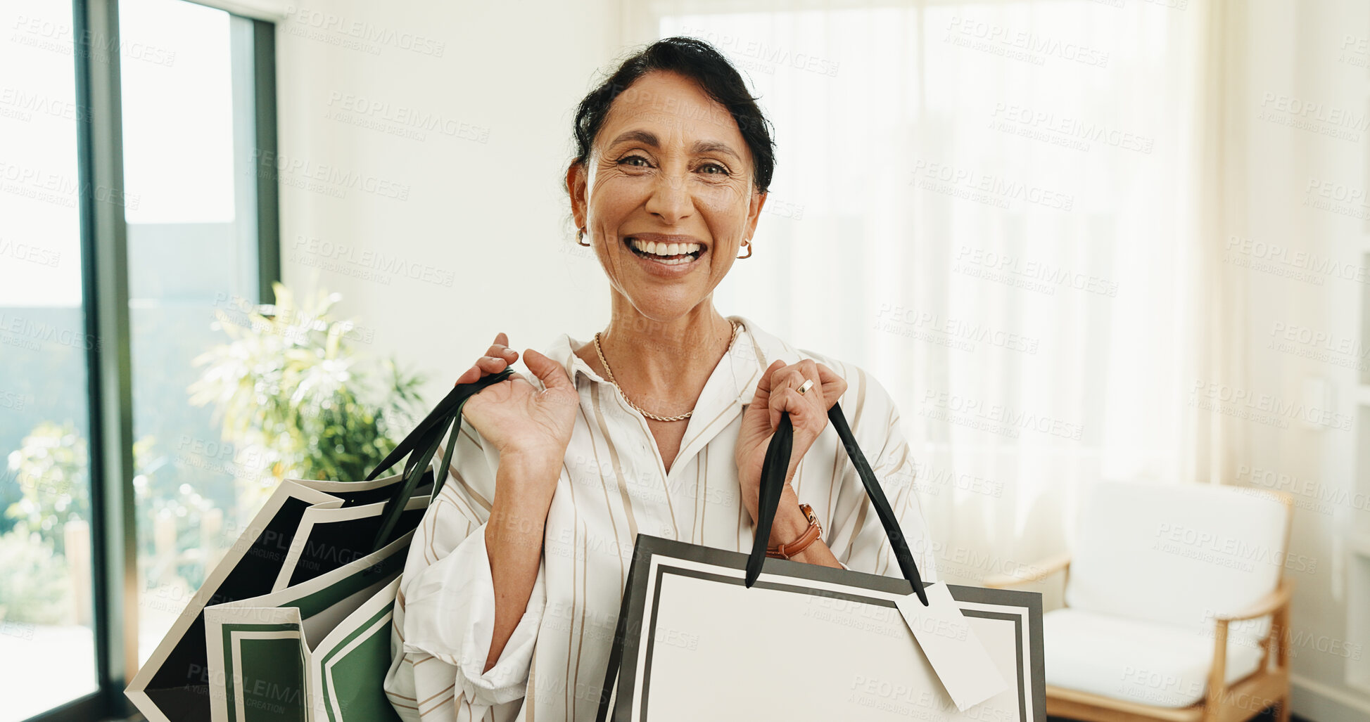 Buy stock photo Smile, woman and shopping bag at house for fashion, clothing haul and purchase for retail spree. Portrait, mature person and package in home with new outfit, bargain and discount for wardrobe restock