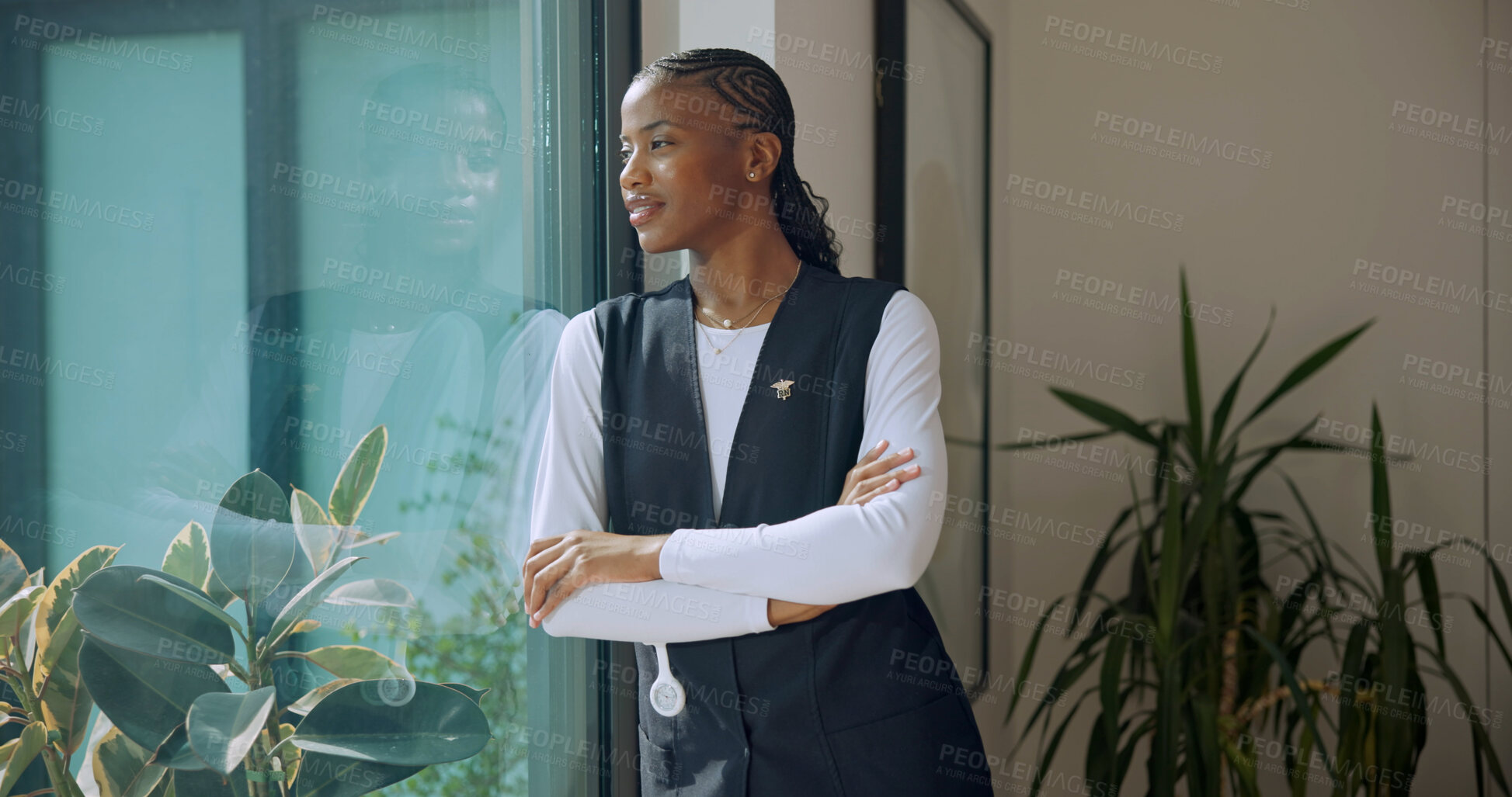 Buy stock photo Thinking, nurse and woman with arms crossed for medical decision, wellness or thoughts by window. Reflection, happy black person or caregiver with healthcare vision, confidence or mindset in homecare