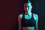 Woman, confidence and portrait in studio for fitness, gym clothes and mock up space on dark background. Person, girl and pride with sports bra for wellness, exercise gear and healthy body in Colombia