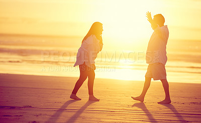 Buy stock photo Sunset, ocean and couple with vacation, dancing and bonding together for anniversary. Mature people, beach and man with woman, celebration or romance for relationship, marriage and happy with break