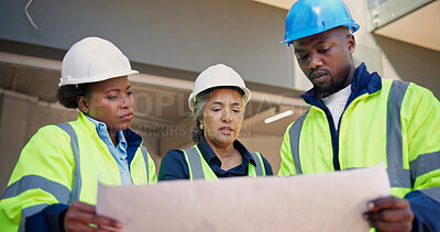 Buy stock photo Engineer, reading and team with blueprint, construction and plan for renovation project and design. Civil engineering, low angle and people with paperwork, collaboration and property development