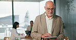 Tablet, scroll and mature man in office with research, business sustainability and carbon footprint. Manager, person and risk assessment in workplace with tech, CSR report or plan for zero emissions.