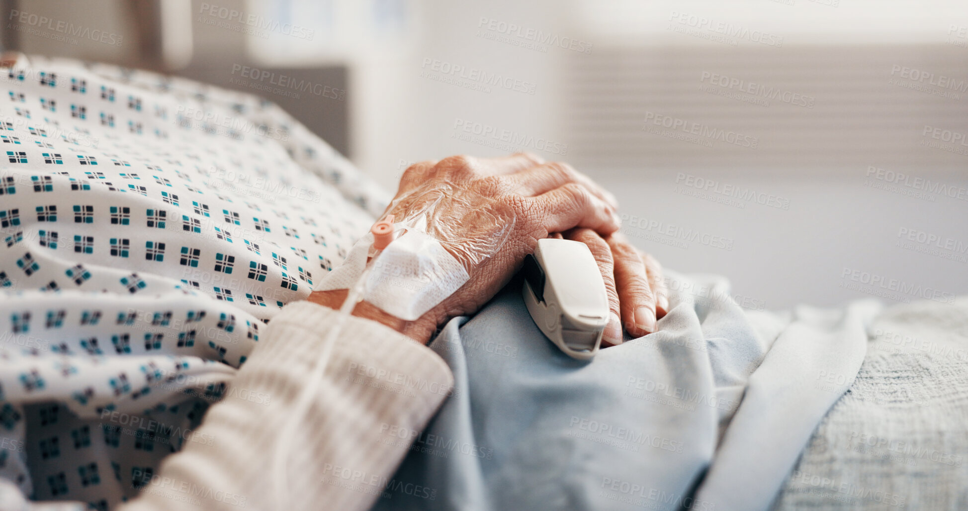 Buy stock photo Elderly, person and hands in hospital bed with iv drip, medical treatment and hydration for recovery. Healthcare, senior patient and healing in clinic with oximeter, intravenous fluid or antibiotics.