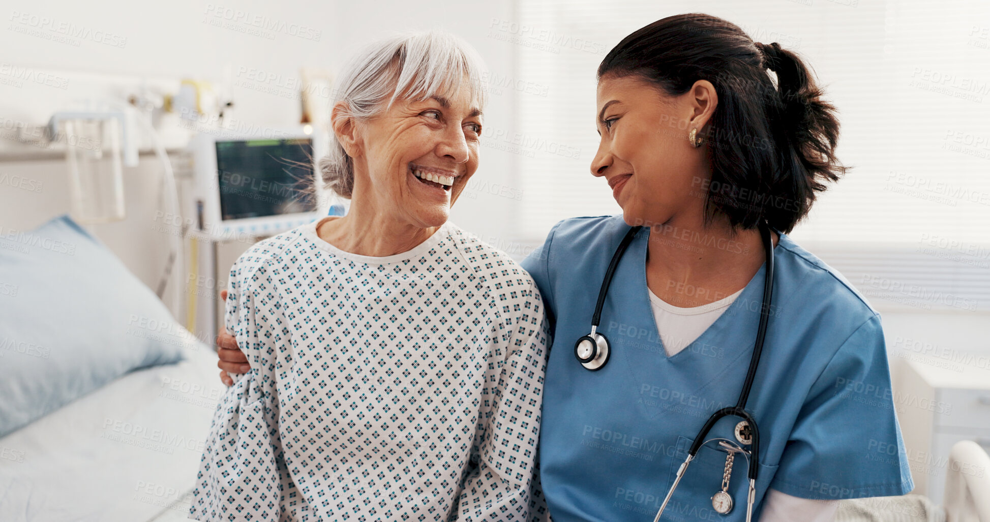 Buy stock photo Happy, nurse and old woman on hospital bed with hug, support and good news for recovery from disease. Healthcare worker, senior person and embrace in clinic with smile, help and healing from illness.