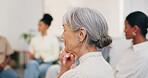 Counseling, group or woman in clinic with thinking, advice reflection or insight on mental health. Consultation, back or mature person with aid, growth evaluation or guidance clarity in peer support.