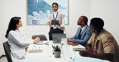 Buy stock photo Medical student, research and presentation with tablet in boardroom, talk and explaining case study. Healthcare, team and people with technology, discussion and treatment plan on website in office